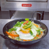 Nasi Goreng is the popular Indonesian fried rice which is traditionally served with a fried egg. 
Anyone who has been to Indonesia would be familiar with Nasi Goreng and probably had it almost every day because it’s everywhere and super delicious! As with
